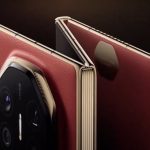 Shot of a red phone that folds into three, against a black background